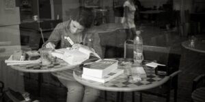 woman sitting at a cafe