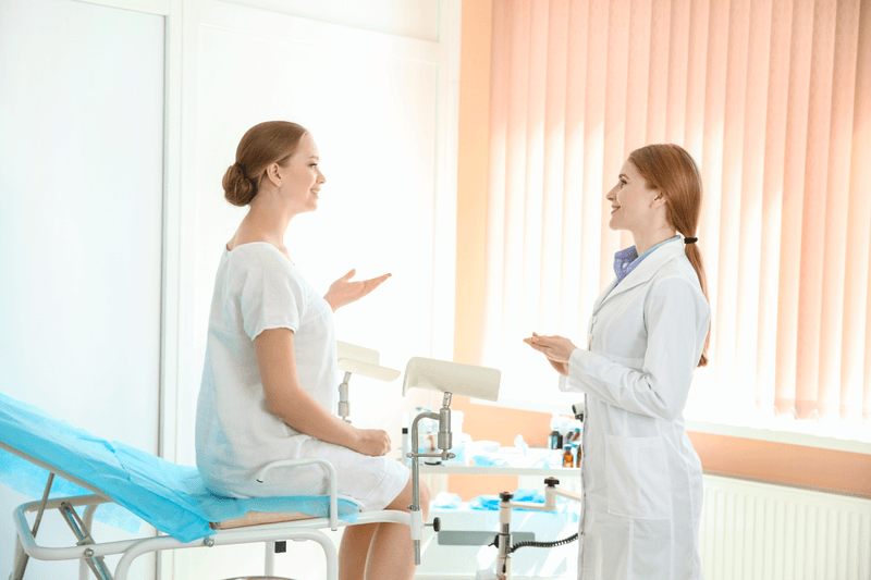 woman talking to a doctor