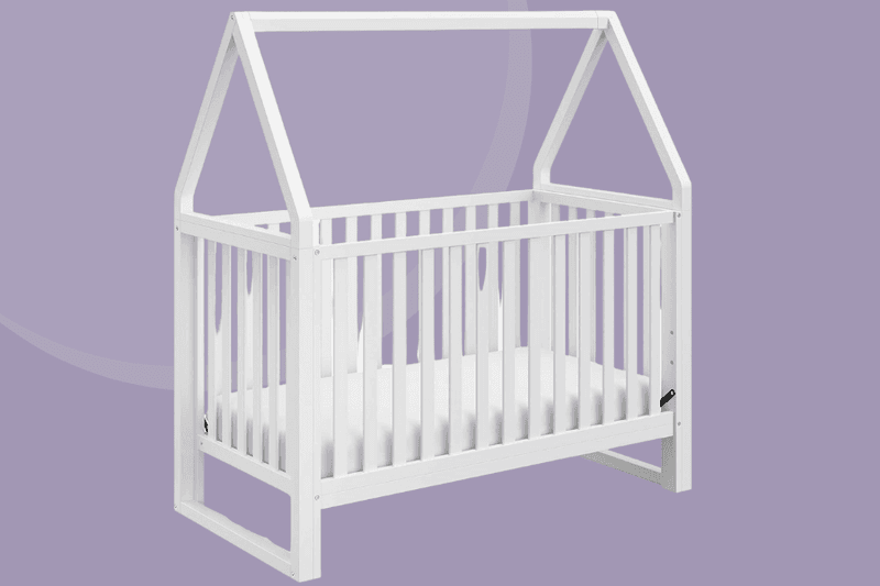 storkcraft Orchard 5-in-1 Convertible Crib (White) with a detachable canopy
