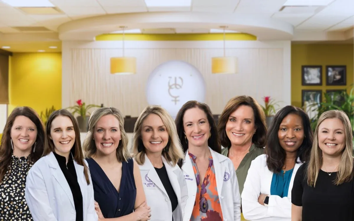Female gynecologist consulting with patient in comfortable medical office setting